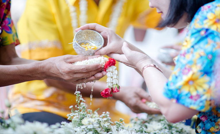 keeping flower in hand capturing cultural moment